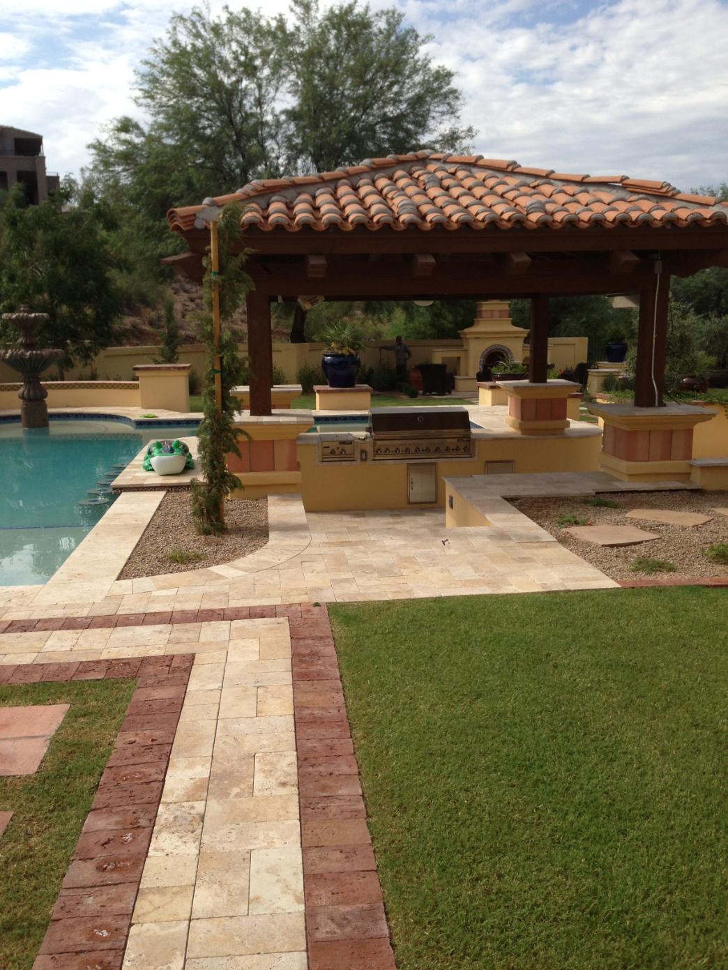 Curved walkway with landscape lighting and plantings